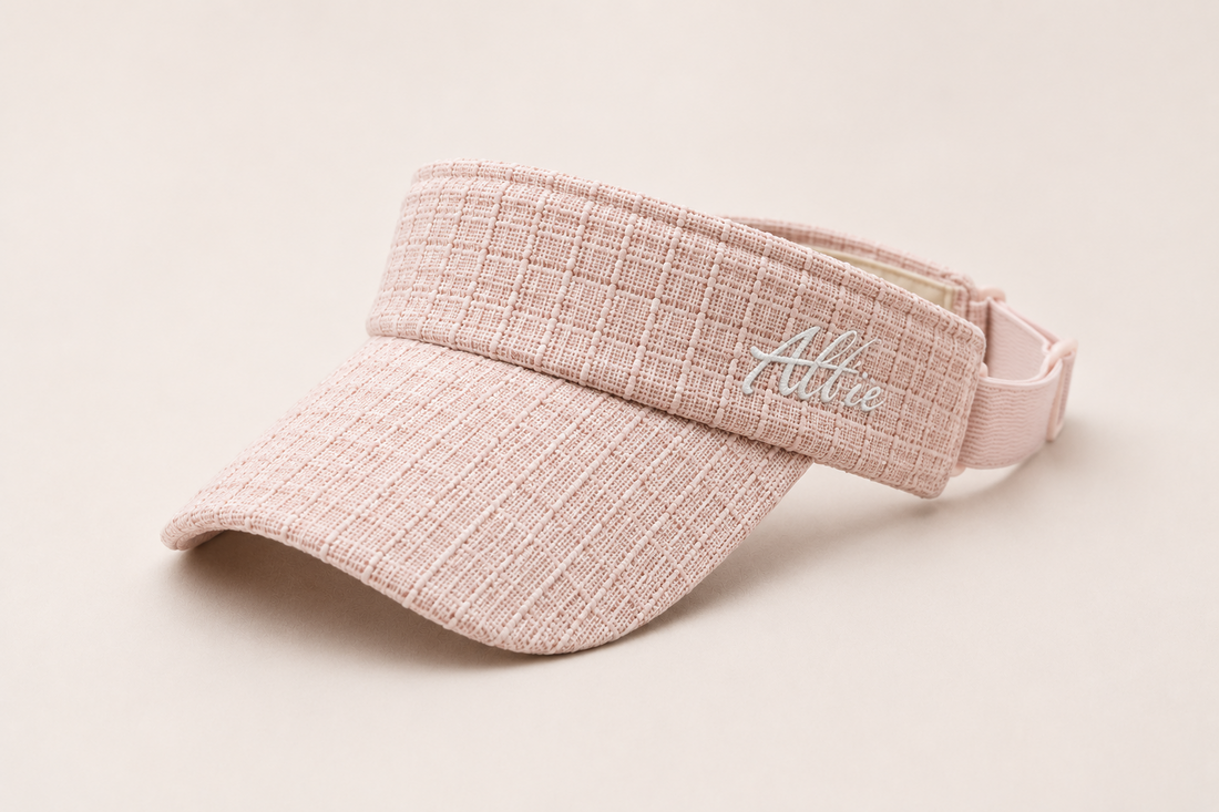 Pale pink textured visor, three-quarter view