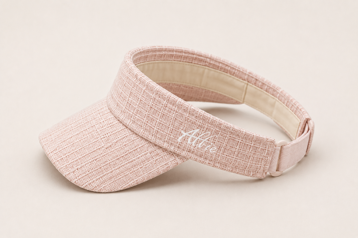 Pale pink visor showing the back adjustment